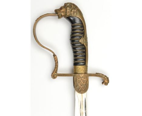 An Imperial German infantry officer’s sword,  plated blade 31½”, by W.K.C, brass stirrup hilt with lion’s head pommel having 