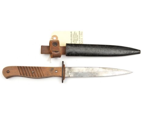 A WWI German trench dagger, blade 5¾” marked ERN/Wald. Rheinl. lightwood square section swollen grip secured by 3 small studs