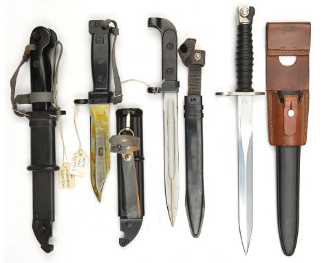 A Russian bayonet, for the AK47 assault rifle, another for AK 74, and another for AK M, all in scabbards, the last 2 incorpor