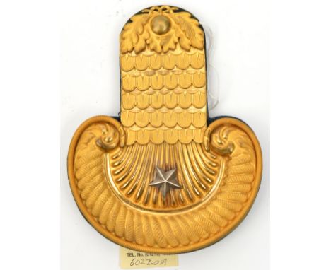 An Imperial German Saxon Guard cavalry officer’s full dress epaulette, of heavy gilt brass with oak leaves, scales and roped 