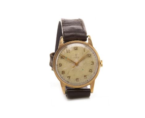 GENTLEMAN'S TUDOR NINE CARAT GOLD MANUAL WIND WRIST WATCHsigned Tudor 15 rubies movement, the round sunburst dial with applie