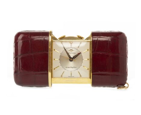 MID TWENTIETH CENTURY MOVADO PURSE WATCH the square silver coloured dial with applied gold coloured baton hour markers, inner