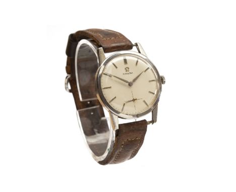 GENTLEMAN'S OMEGA STAINLESS STEEL MANUAL WIND WRIST WATCH1960s, the round white dial with applied stainless steel baton hour 
