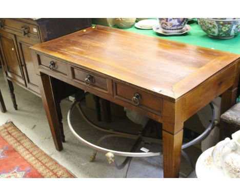 A modern hardwood side table, the plain top above three drawers, raised on square tapering legs CONDITION REPORTS Approx 104c