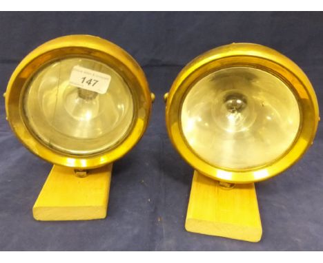A collection of various lamps to include two Brolt lighting system head lamps, two radiator lamps, two "The Ceag" inspection 