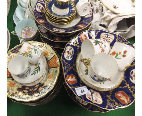 A collection of decorative china wares to include two 19th Century Mason's style plates painted in the Imari palette, a late 