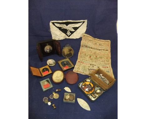 A box of assorted miscellaneous sundry items to include silver photograph frame, various photographic images, miniatures, lea