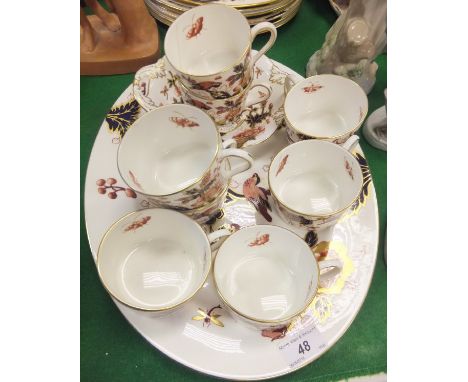 A Coalport "Hong Kong" pattern part dinner and tea service decorated in the Imari palette, to include oval platter, cups and 