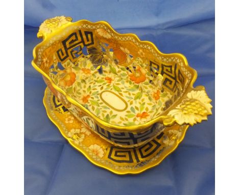 A 19th Century Spode style pottery Japan pattern basket on stand, a 19th Century sucrier, cover and stand painted in iron red