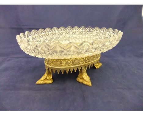 An early 19th Century cut glass fruit bowl on an early Victorian foliate pierced gilt metal stand by Henry Wilkinson & Co, be