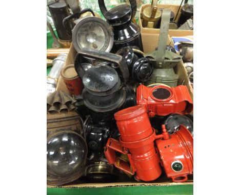 A collection of various cycle and other lamps to include a red painted GPO front and rear lamp, a Joseph Lucas Aceta Major, N