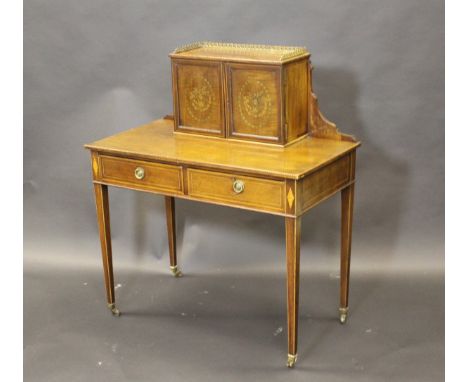 An Edwardian mahogany and marquetry inlaid bonheur du jour, the three quarter galleried top section with two panelled marquet