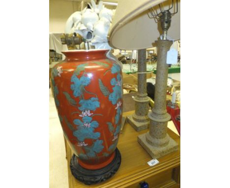 A pair of painted columnar table lamps, together with an Oriental porcelain baluster shaped vase decorated with water lilies 