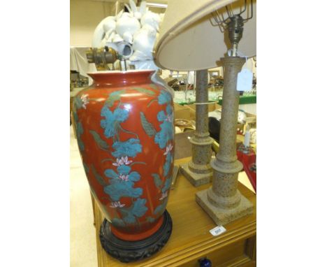 A pair of painted columnar table lamps, together with an Oriental porcelain baluster shaped vase decorated with water lilies 