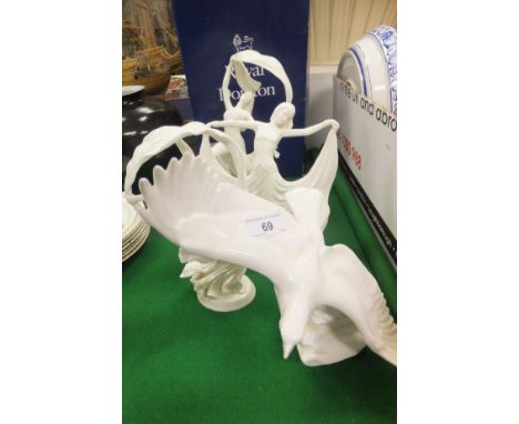 A Royal Doulton figurine "Images of Nature - Soaring High", three Royal Worcester figurines "Spirit of Dance", No'd. 4744/500