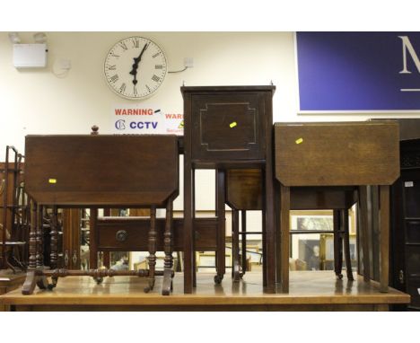 A mahogany and cross-banded Sutherland table on brown china castors, together with a mahogany corner display cabinet with mou