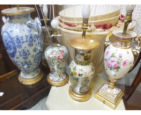 A Continental porcelain twin-handled urn decorated with peonies and butterflies (mounted as a table lamp), together with thre