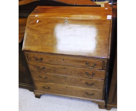 A 19th Century mahogany bureau, the sloping fall front enclosing a basic fitted interior over four long graduated drawers, to