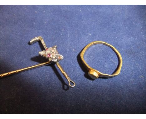 A 3rd Century BC Hellenistic gold ring with simple seal top, together with a 9 carat gold diamond and ruby inset stock pin of