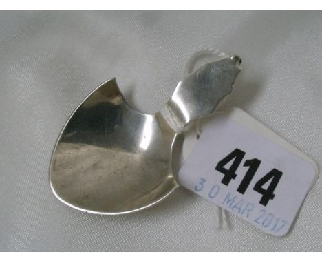An unusual caddy spoon with shield shaped  bowl  2.5” long Sheff 1910      