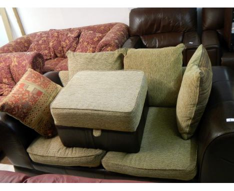 A 2 seater leather settee & pouffe