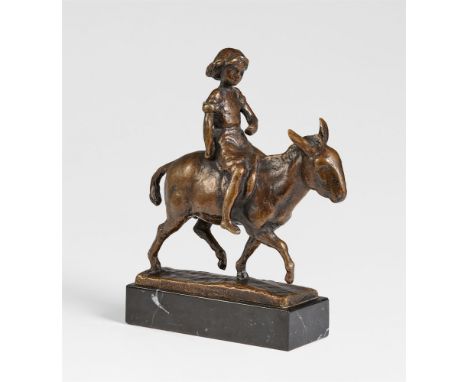 August Gaul, EselreiterinBronze. Höhe 15,2 cm. Auf Marmorsockel (2,4 x 4,7 x 12,1 cm) montiert. Auf der Plinthe signiert 'A G
