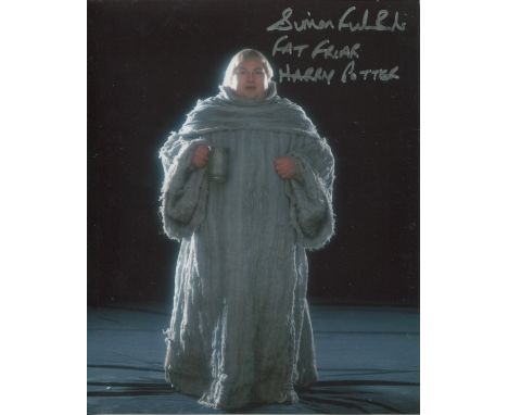Harry Potter. 8x10 photo from the Harry Potter movies signed by actor Simon Fisher-Becker who played The Fat Friar. Good Cond