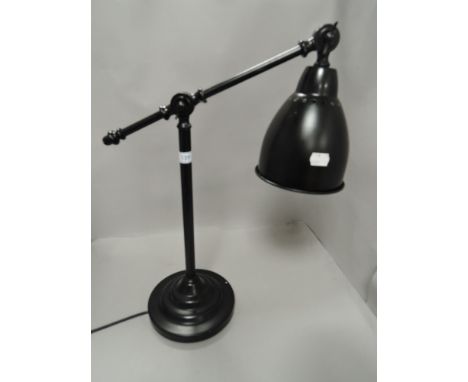 A modern adjustable office desk top lamp