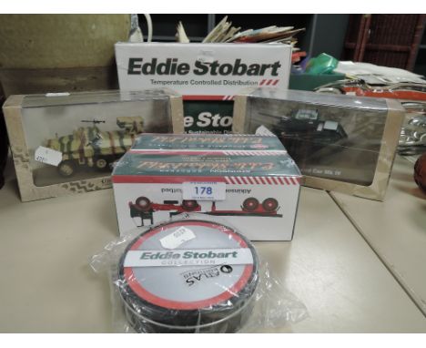 Three Eddie Stobart die cast model trucks and two Atlas military vehicles