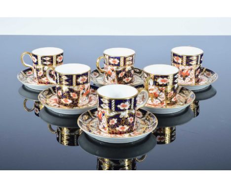 A set of six Royal Crown Derby Imari style pattern coffee cans and saucers