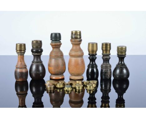 An interesting collection of 19th century and later bottle wax seals, each with wooden turned handles and having interchangea