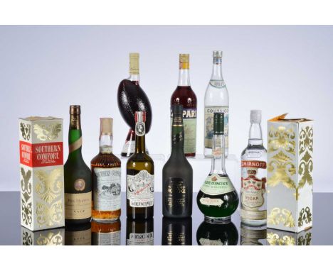 Eleven bottles of spirits and alcohol, including three bottles of Southern Comfort, a Smirnoff Vodka, two bottles of Calvados