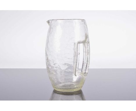An early 20th century Loetz glass jug designed by Kolomon Moser, 22cm high, the "Cracked Ice" pitcher with crackle effect and