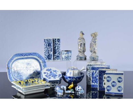 A collection of Chinese blue and white and other porcelain and ceramic items, including four blue and white flower bricks, a 