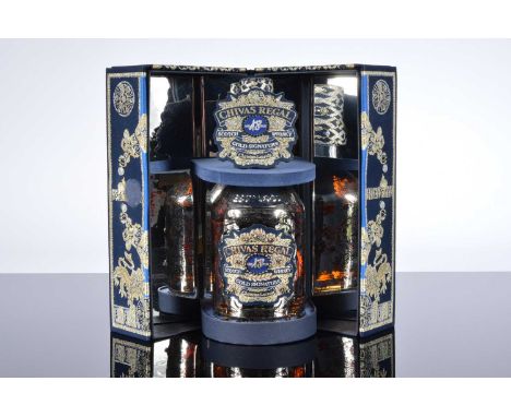 A Limited Edition bottle of Chivas Regal Aged 18 Years Scotch Whisky Gold Signature by Christian Lacroix, in material covered
