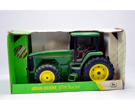 Ertl 1/16 John Deere 8300 Tractor. VG to E in Box.