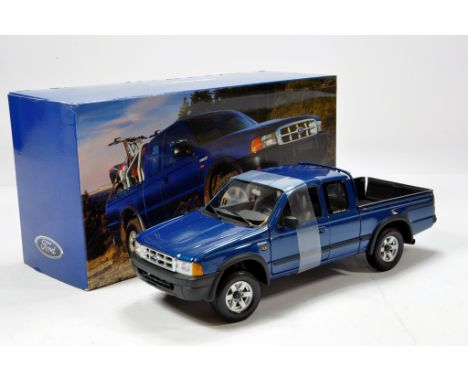 An Action Diecast Promotional 1/18 model of the Ford Ranger Pickup. NM to M in Box.