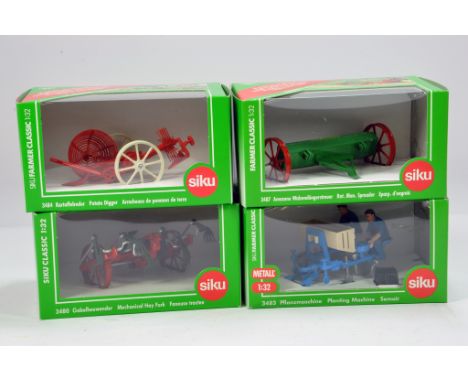 Siku 1/32 Farm Group including Potato Digger, Man Spreader, Mechanical Hay Rake and a Planting Machine. NM to M in Boxes. (4)