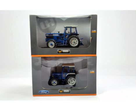Universal Hobbies 1/32 Tractor Duo. Ford 8830 (some light damage) plus 6810. Generally E to NM in Boxes. (2)