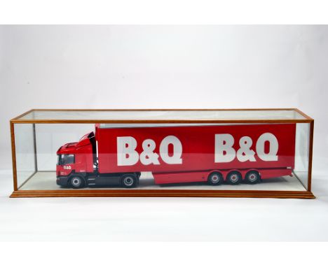 An impressive hand built bespoke model of a 1/24 scale Scania 114L Truck and Trailer customised in the livery of B&amp;Q. It 