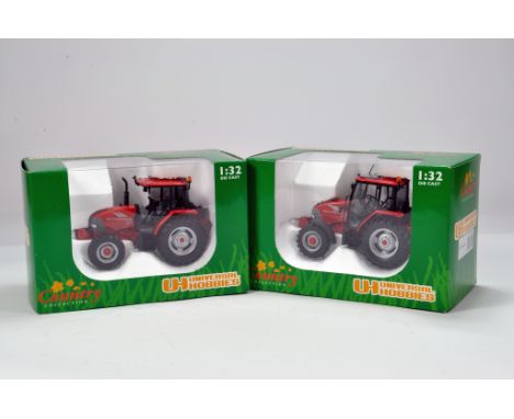 Universal Hobbies 1/32 Tractor Duo including McCormick CX95 x 2. M in Boxes. (2)