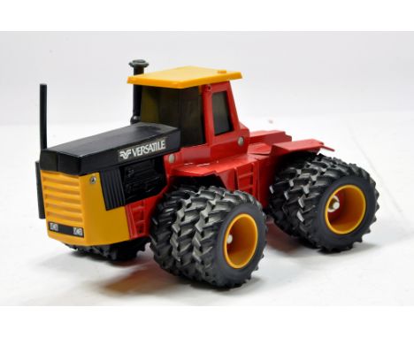 Scale Models 1/32 Versatile Tractor on triples. VG to E. 