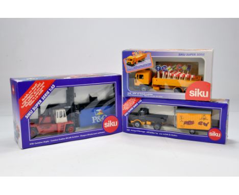 Siku 1/50 Diecast Group comprising 3725 Container Lift, 2610 Road Lorry and 2533 Unimog with Trailer. NM to M in Boxes. (3)