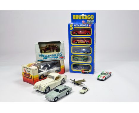 An assortment of diecast vehicles from various makers. Generally G to M. (8)