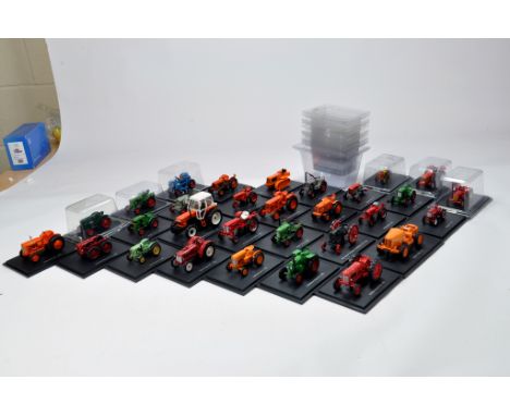 A large group of Hatchette issue 1/43 scale Tractors. Some light damage but generally VG to E. Mostly with perspect shell cas