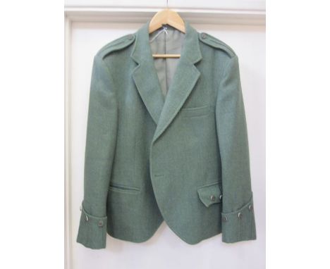 Scottish wool kilt in black, navy, green, light blue and yellow, a gentleman's Scottish wool mid blue jacket with horn button
