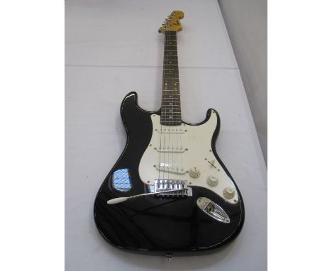 Squier Strat by Fender electric guitar with Emex European hard case, 100cm long approx. Condition ReportAppears to be in over