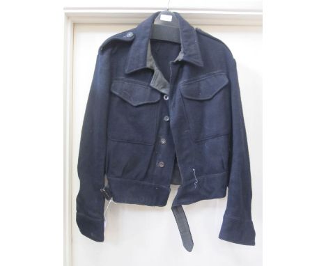 Grey military flying jumpsuit with label 'Size No.8, 22C/1144, Height 6ft - 6ft 3, breast 39"-42", numbered 28627', a navy bl