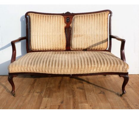 Edwardian mahogany framed two seat sofa, twin upholstered back panels with pierced central splat, outswept arms raised on cab