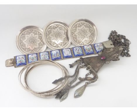 Indian silver and enamel bracelet, a pendant, three Persian silver dishes and six bangles.  